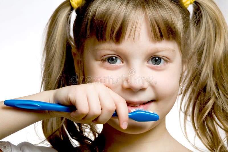 Girl with toothbrush