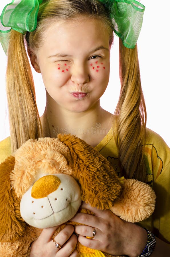 A girl with a toy royalty free stock photography