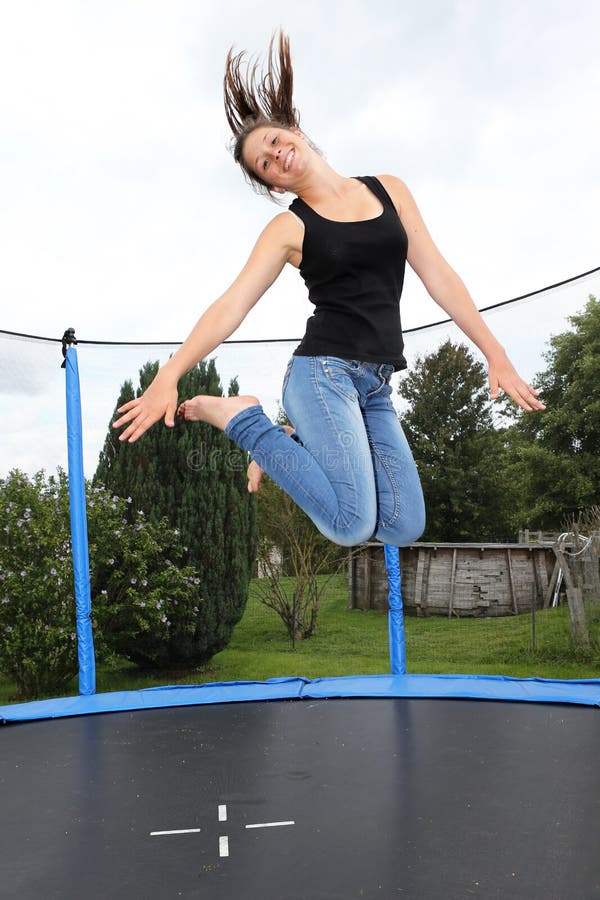 Girl and trampoline stock image. Image of laugh, child 44634419
