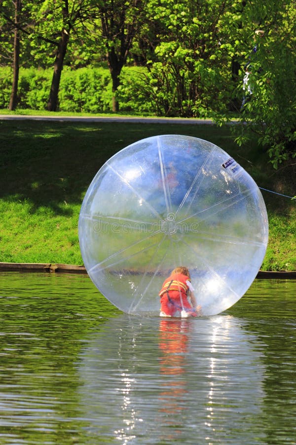 The girl in a transparent sphere stock images The girl in a transparent sphere stock images