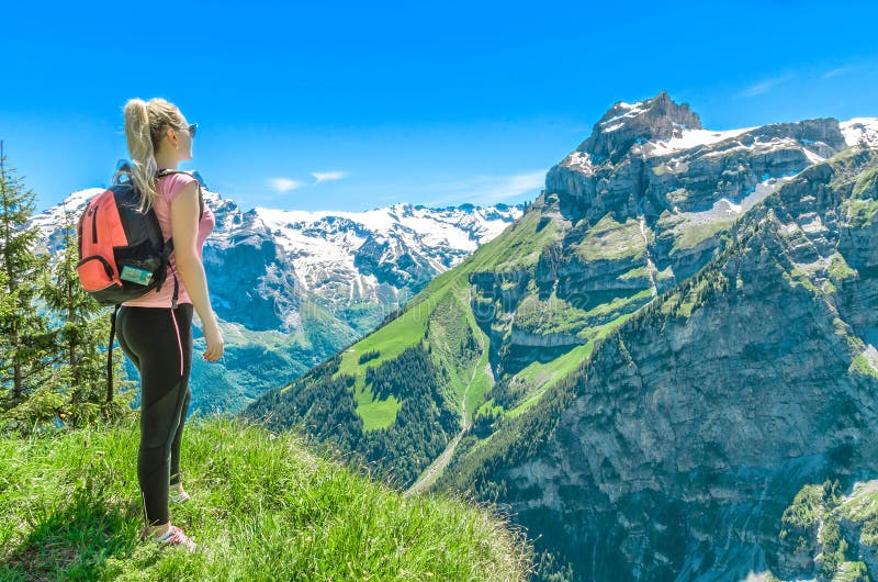 Girl Traveler Against the Backdrop of the Mountain Peaks, the En Stock ...