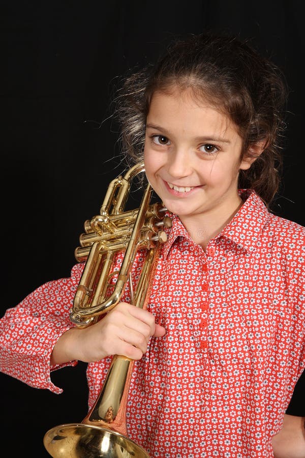 Girl with trumpet stock photo. Image of jazz, adolescent 35927208