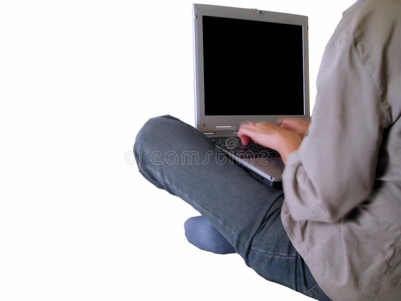 Girl typing on a laptop royalty free stock image Girl typing on a laptop royalty free stock image