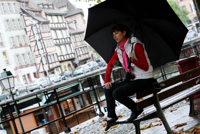 Girl and an umbrella in Strasbourg