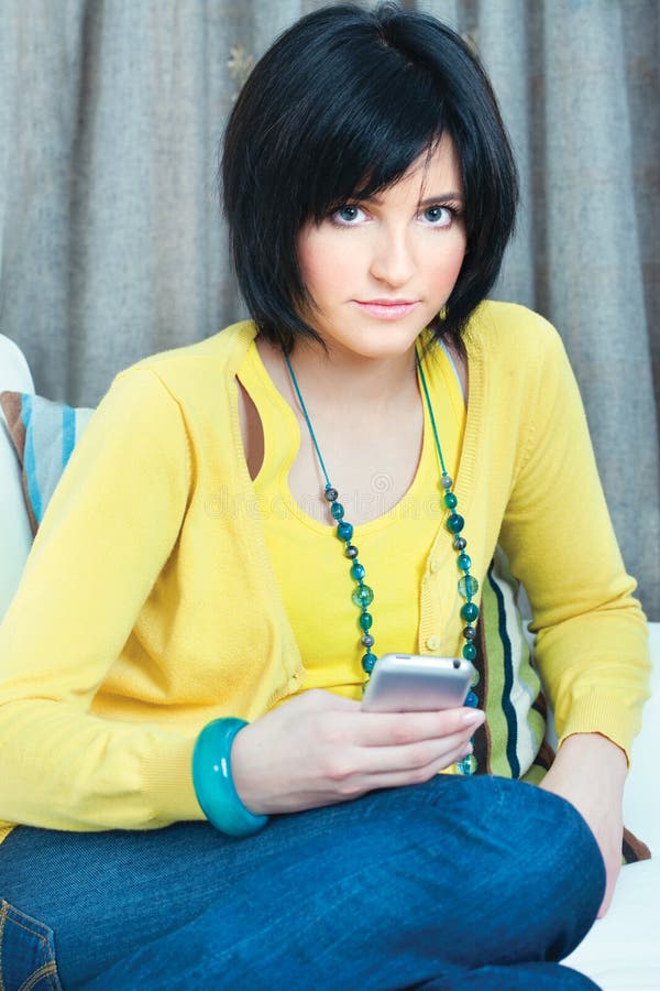 Girl using mobile phone stock photo. Image of casual 22458838