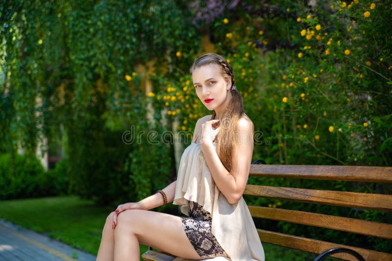 Girl with very long legs in a short skirt