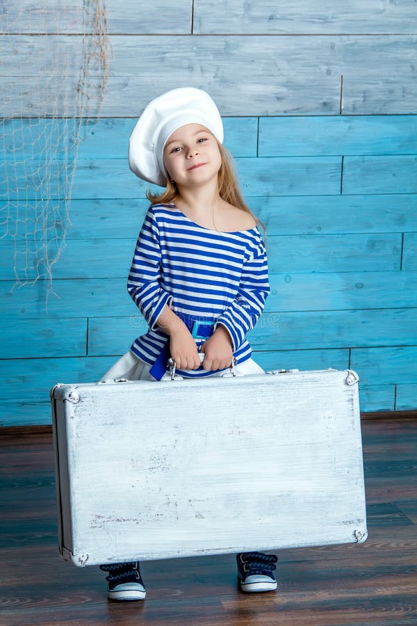 Girl in Vest Holding a Suitcase Stock Photo Image of smile, happiness