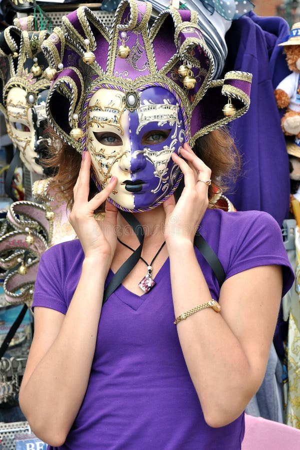 A girl in violet mask royalty free stock image A girl in violet mask royalty free stock image