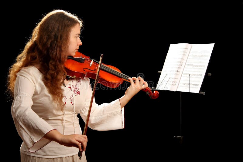 Girl violinist and pult