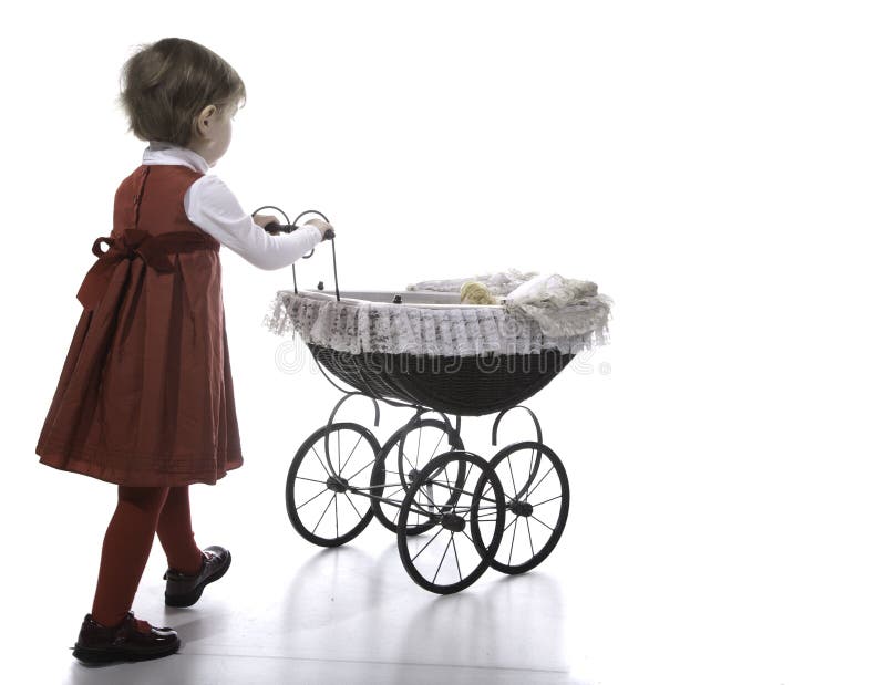 Girl vith vintage pushchair