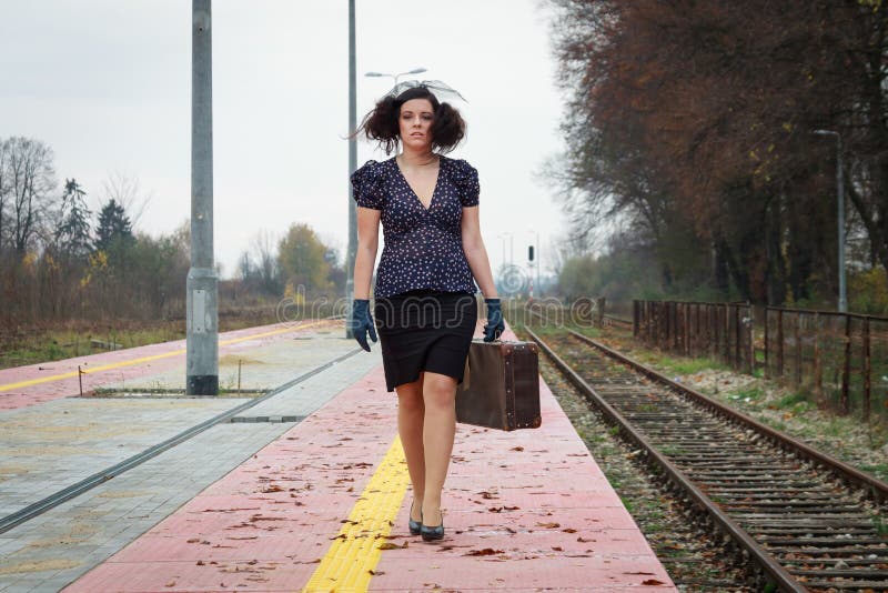 Girl waiting for train