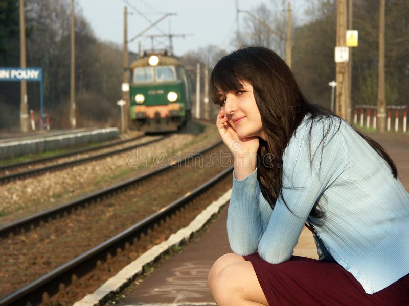 Girl waiting for the train