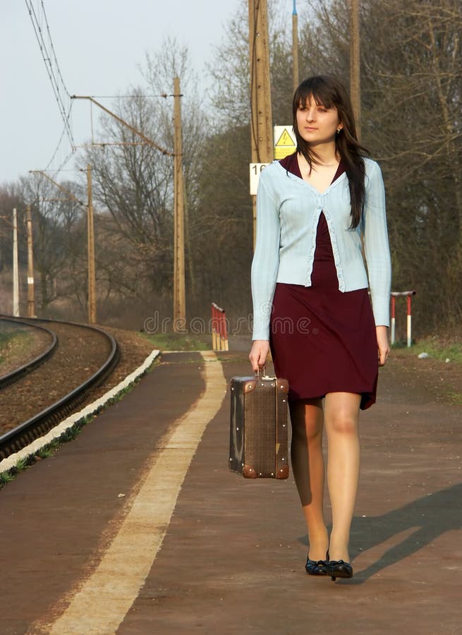 Girl waiting for the train