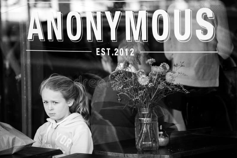 Girl waits for order alone at a cafe looking sad and alone royalty free stock image Girl waits for order alone at a cafe looking sad and alone royalty free stock image