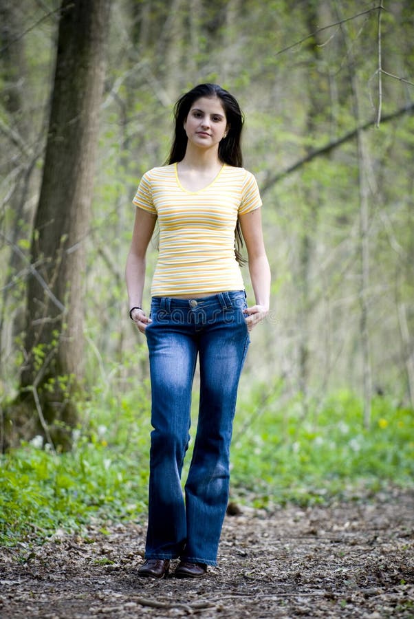 Girl walking in the forest