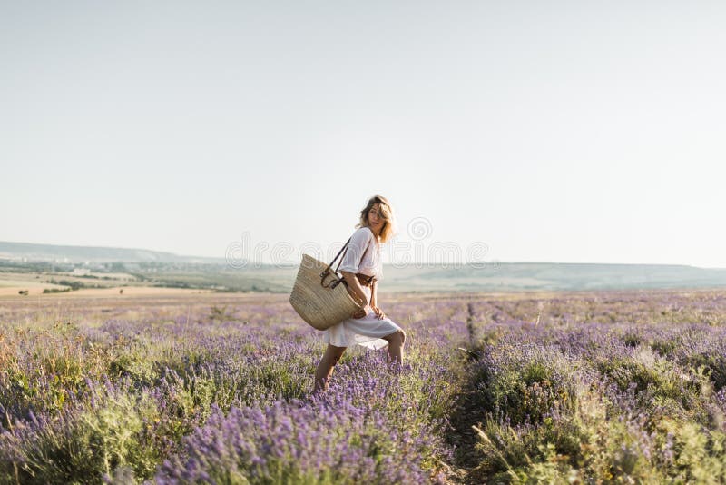 Girl Walking in Lavender Fields, Beautiful Blooming Lavender Field