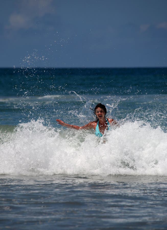 Girl, wave and fun stock photo. Image of wave, shore, women - 9009020