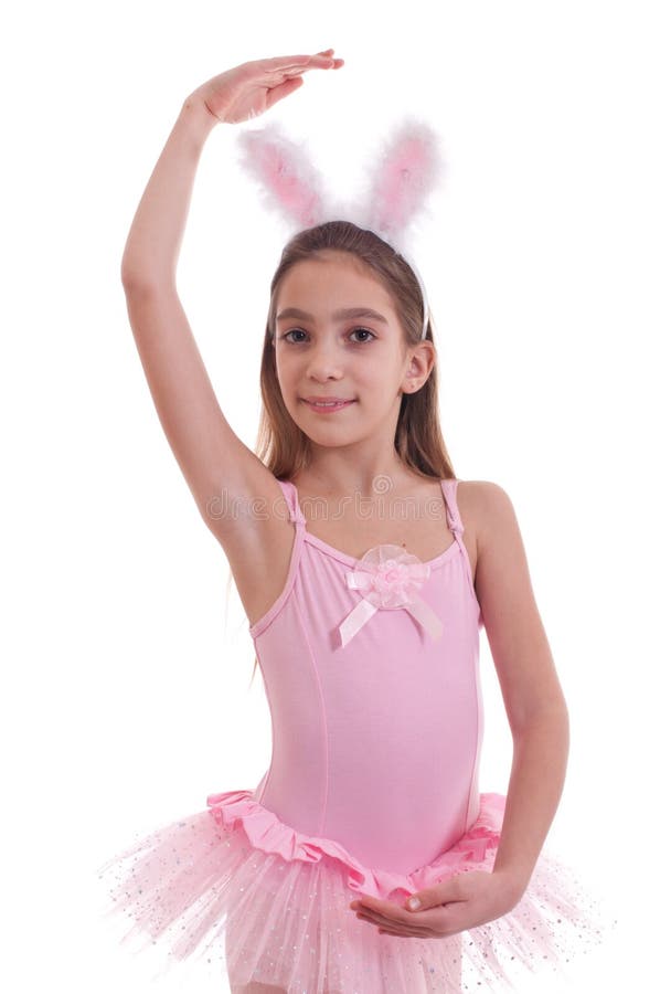 Girl wearing bunny ears on white