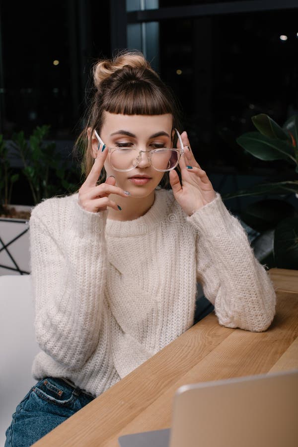 Girl Wearing Glasses and Looking at Laptop Stock Photo - Image of ...