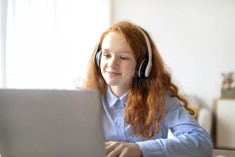 Girl Wearing Headphones Enjoying Music with Smartphone Stock Image ...