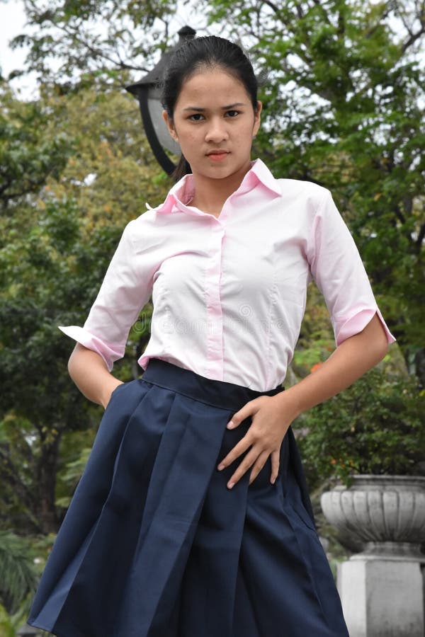 A Girl Wearing Pink Shirt Standing Stock Photo Image of female