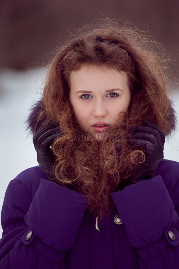 Girl wearing purple jacket stock image. Image of flakes 29341903