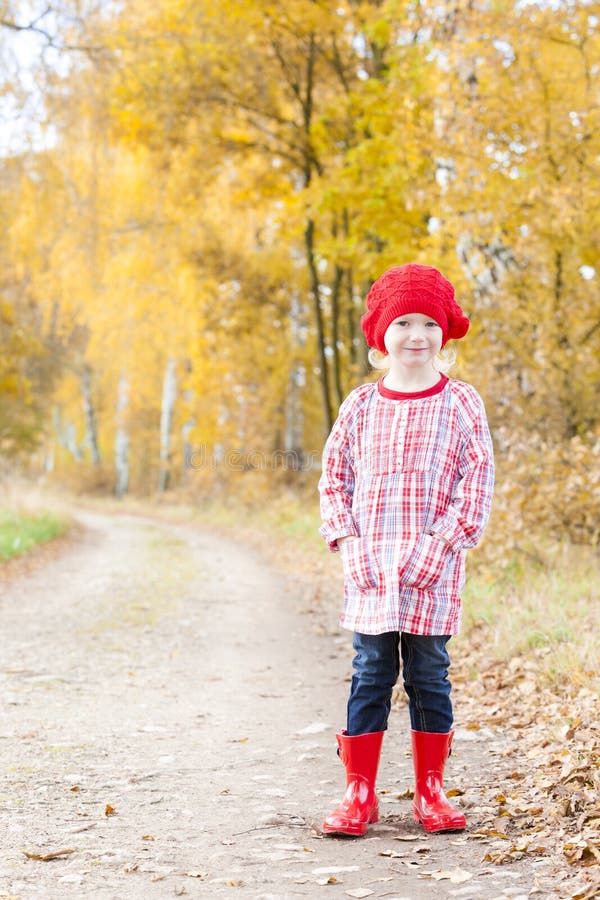 Girl wearing rubber boots stock photo. Image of rubber 23011536
