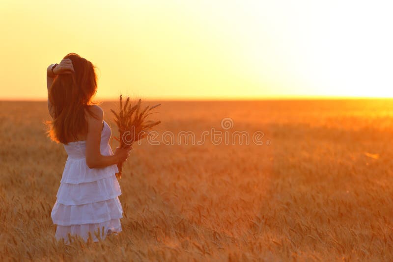 Girl on a wheat field