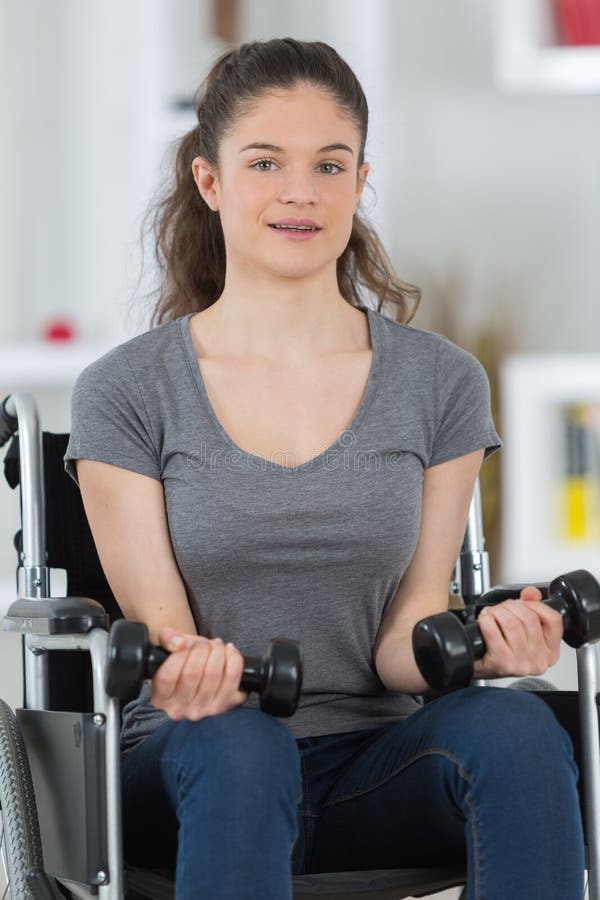 Girl Wheelchair Exercising Stock Photos Free & RoyaltyFree Stock