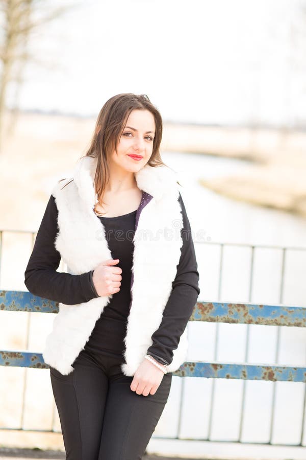 Girl in white fur coat stock photo. Image of bridge, outdoor 51778698