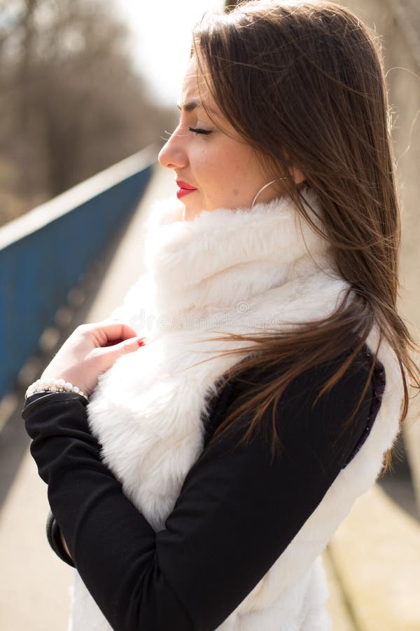 Girl in white fur coat stock photo. Image of posing, white 51778884