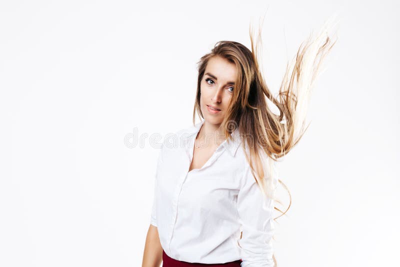Girl in white shirt and burgundy skirt on an isolated white background stock photography Girl in white shirt and burgundy skirt on an isolated white background stock photography