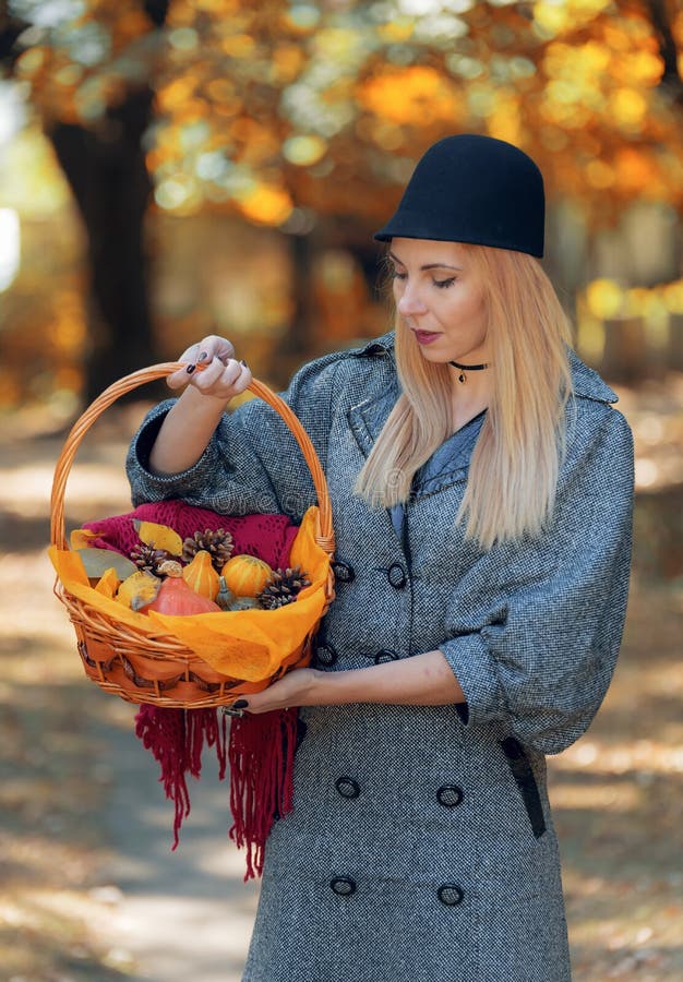 Girl with Wicker Basket Walking through the Woods. Autumn Theme Stock ...