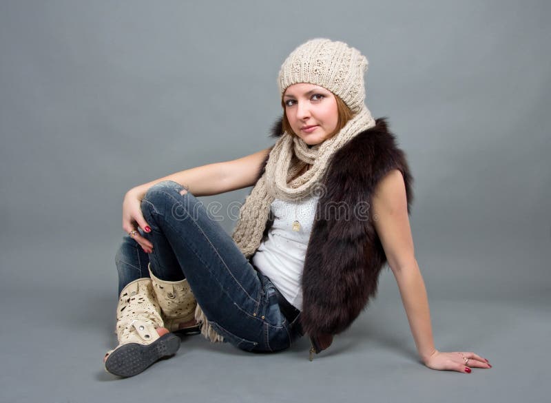 The girl in a winter cap stock photo. Image of scarf 23744798