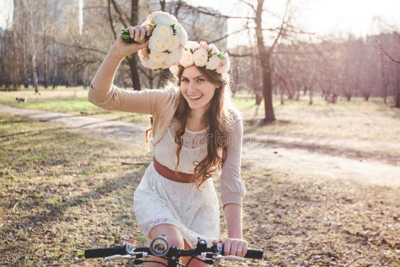 The Girl with the Wreath on the Head by Bike Stock Photo Image of