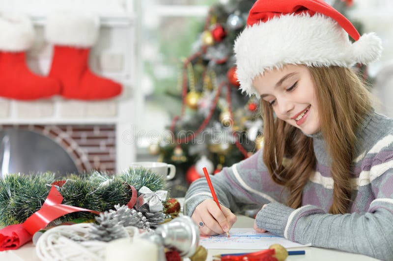 Girl writing letter for Santa