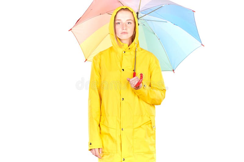 Girl in yellow raincoat stock photo. Image of weather - 97754172