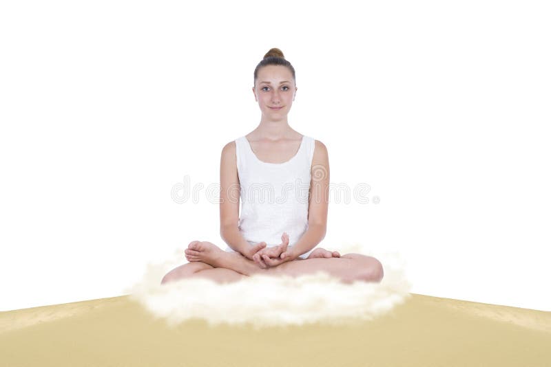 Girl in yoga lotus position on a sand dune