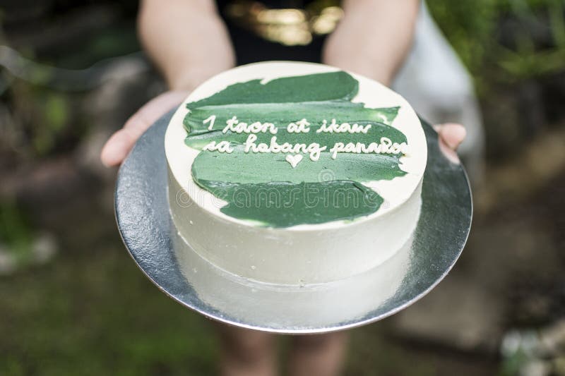 Girlfriend Handing Over a Small Cake with Green Icing and a Heartwarming Message. Tagalog Words Translated As 1 Year and Forever Stock Photo - Image of loving, forever: 193679938 Girlfriend Handing Over A Small Cake With Green Icing And A Heartwarming Message. Tagalog Words Translated As 1 Year And Forever Stock Photo - Image Of Loving, Forever: 193679938