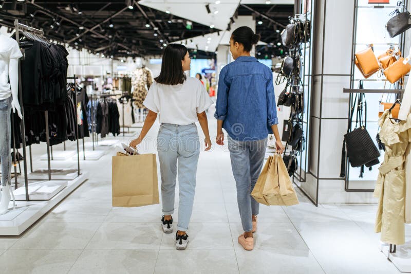 Two Girlfriends with the Bags Near the Car Stock Image - Image of ...