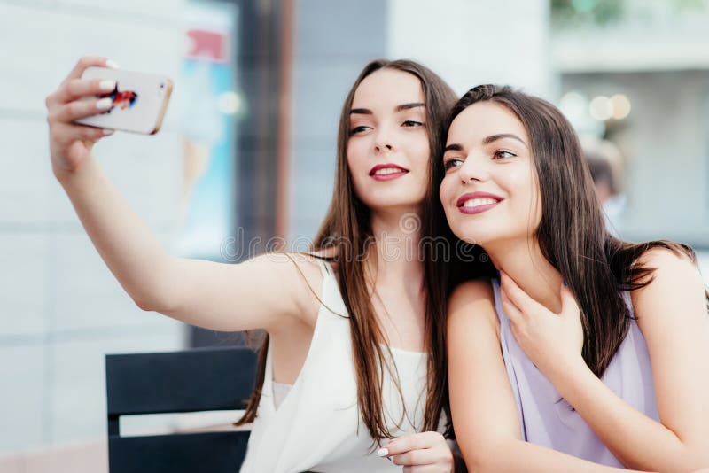 Girls Make a Rest in Coffee and Make Selfies Stock Photo - Image of ...