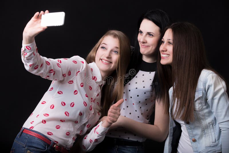 Girlfriends Taking Self-portrait with Mobile Phone Stock Image - Image ...