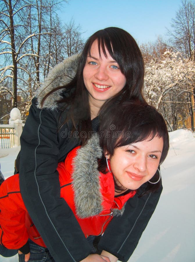 Girls astride the friend on the friend