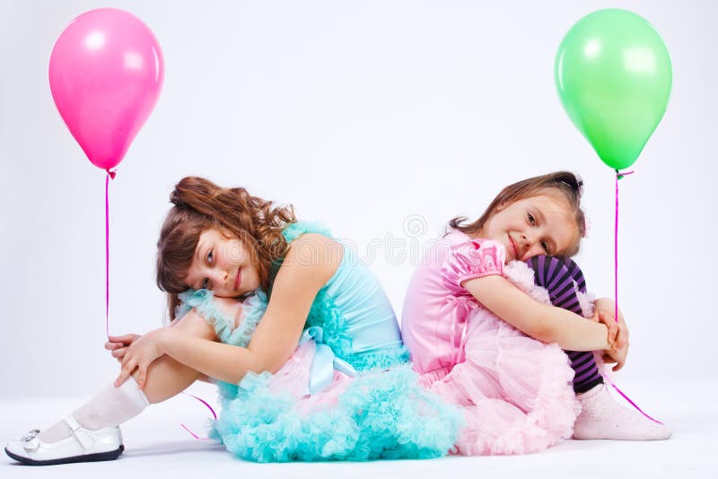 Girls with balloons royalty free stock photos