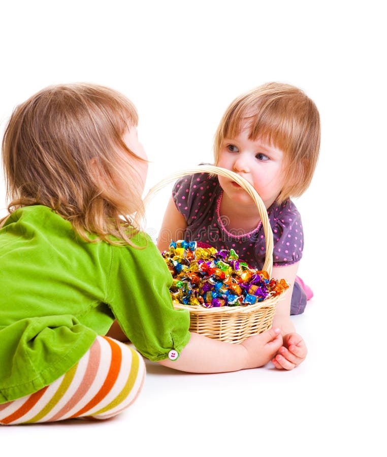 Girls with candies royalty free stock photography