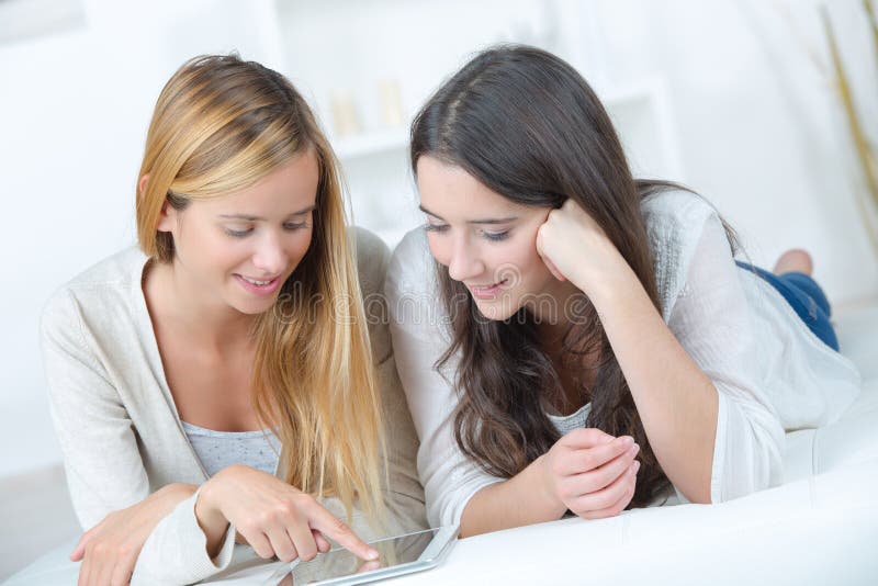 Girls and cellular phone royalty free stock images