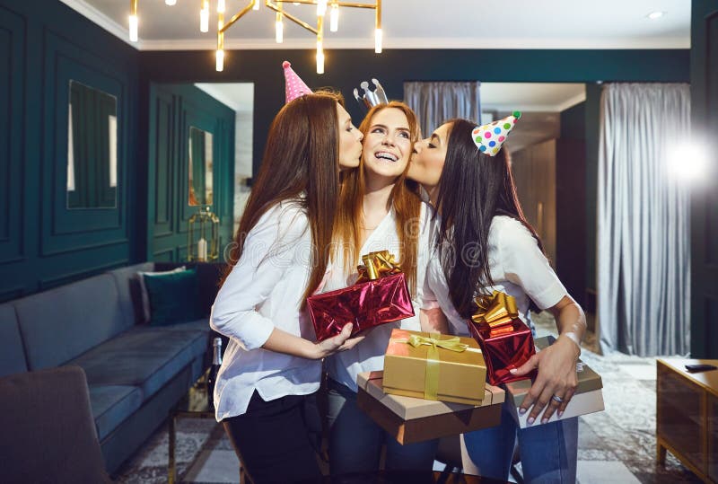 Girls friend congratulate gifts for a birthday party stock image Girls friend congratulate gifts for a birthday party stock image