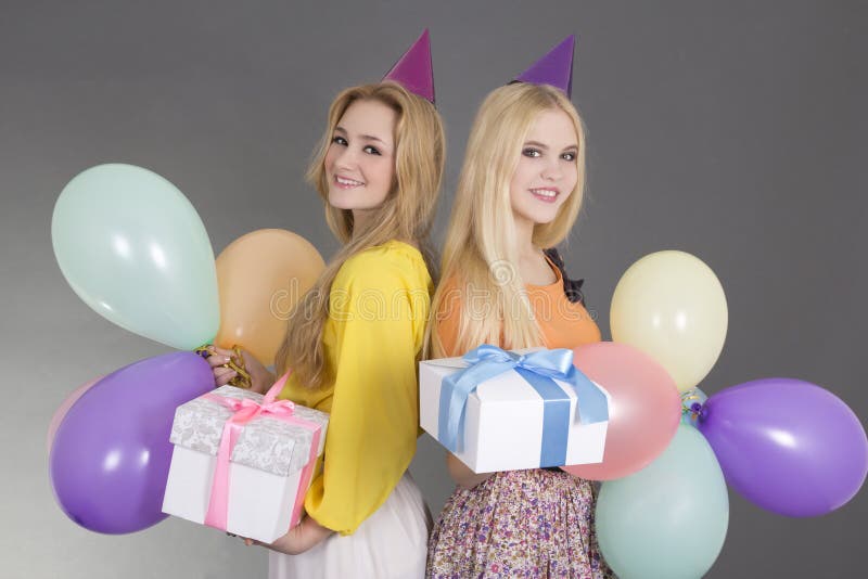 Teenage Girls With Ts And Balloons At A Birthday Party