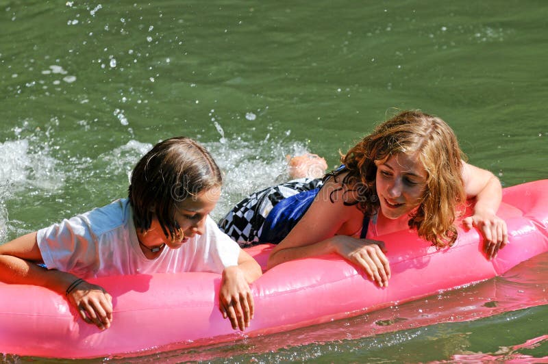 Girls having fun on inflatable