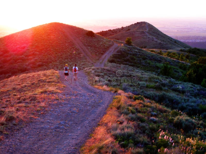 Girls Hiking On Mountains at Sunset